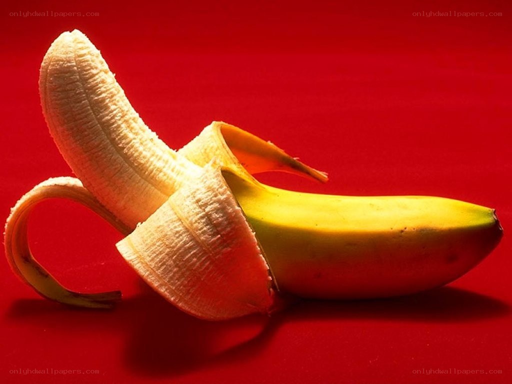 peeled banana on red