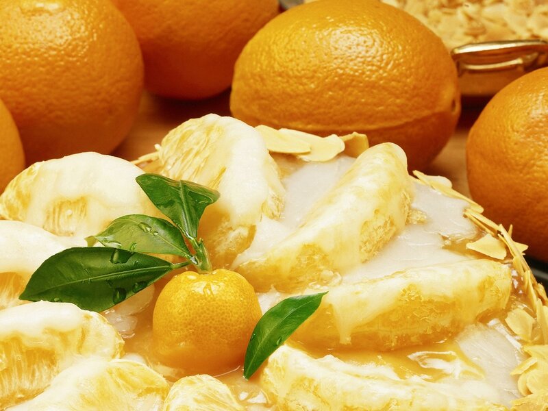 Peeled Oranges with Leaves