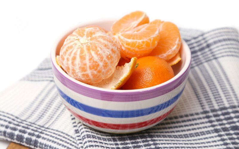 Peeled Tangerines in Bowl