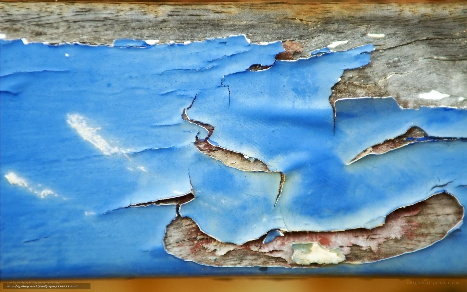 peeling blue paint on wood