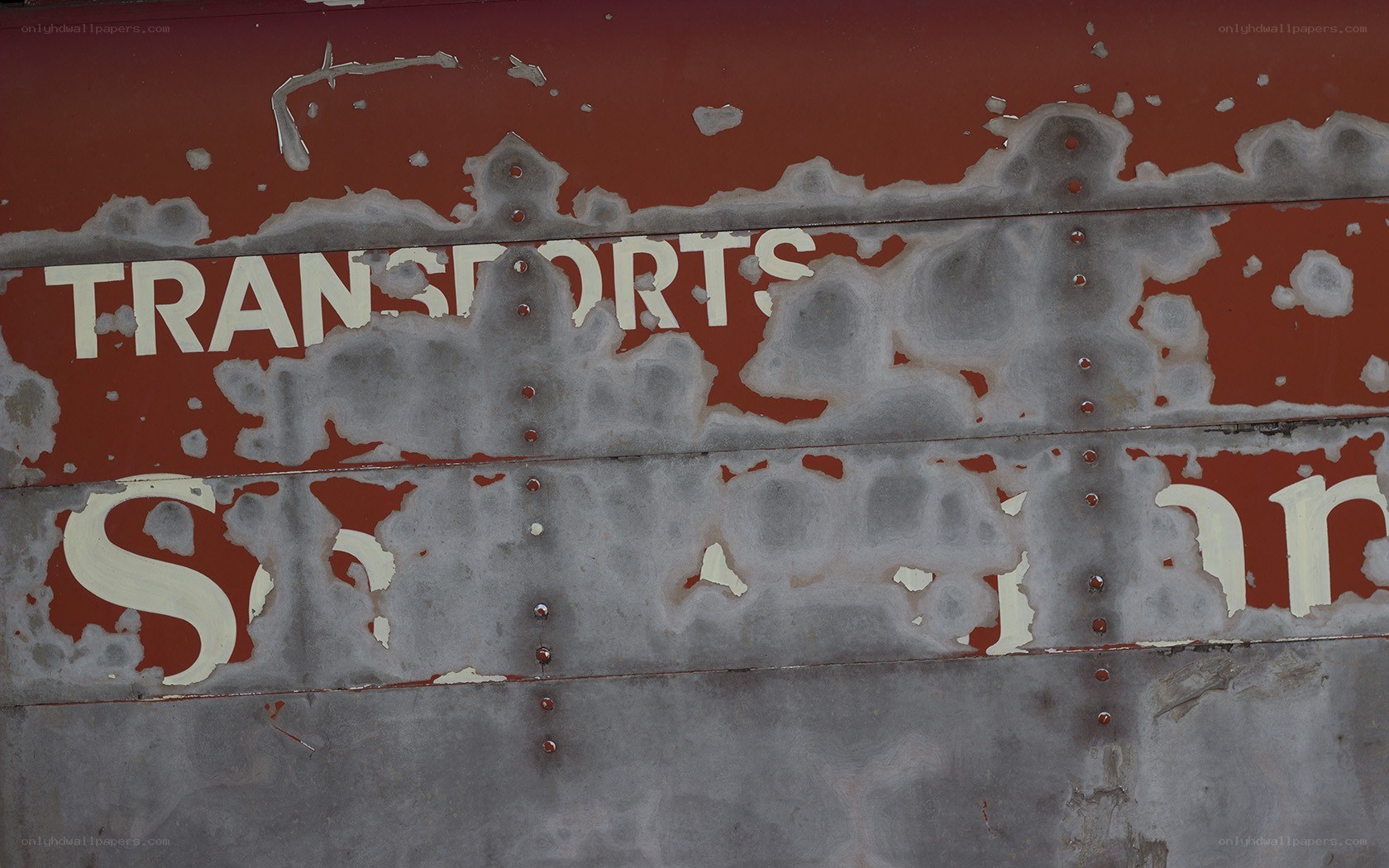 peeling paint on a metal surface