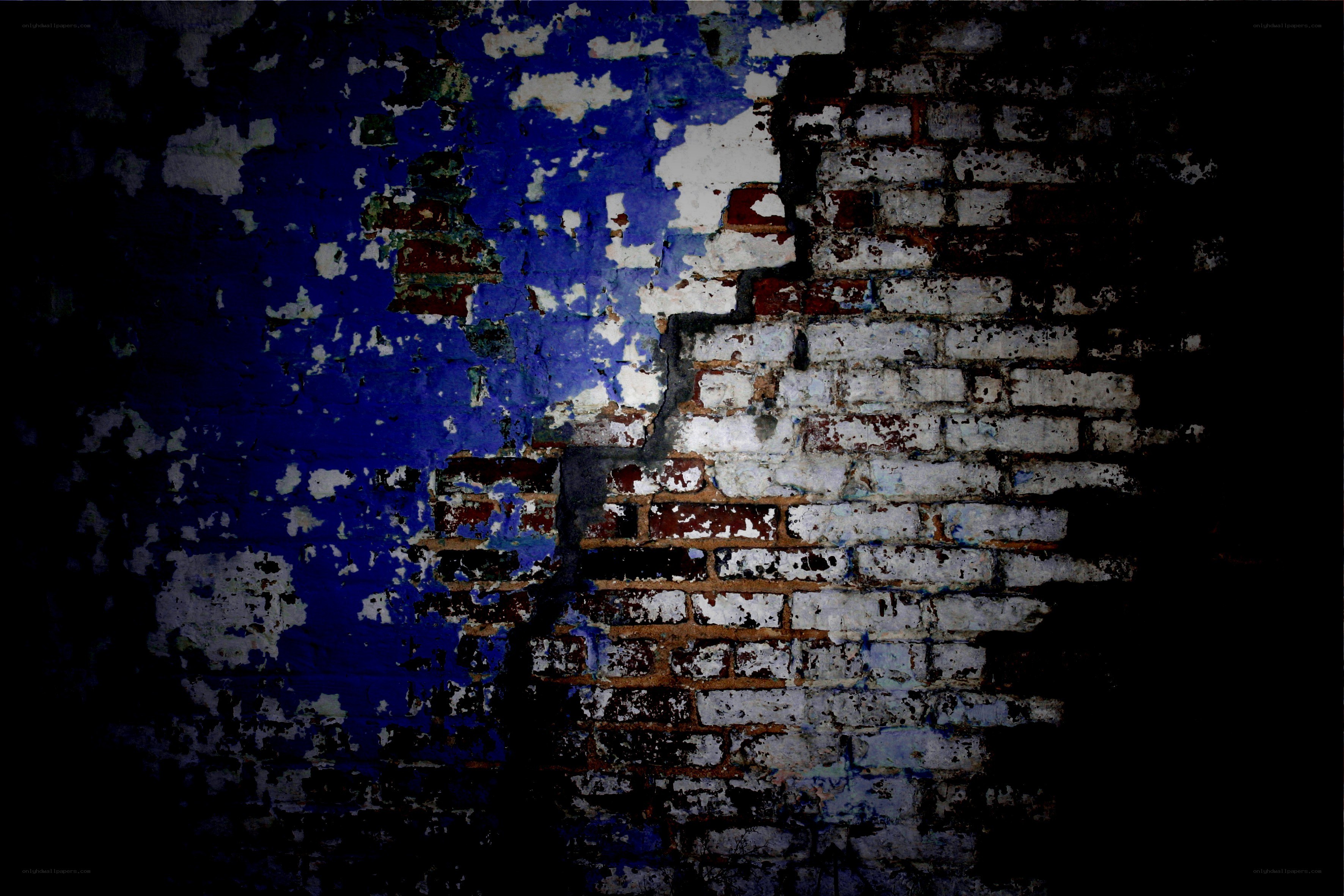 peeling paint on brick wall