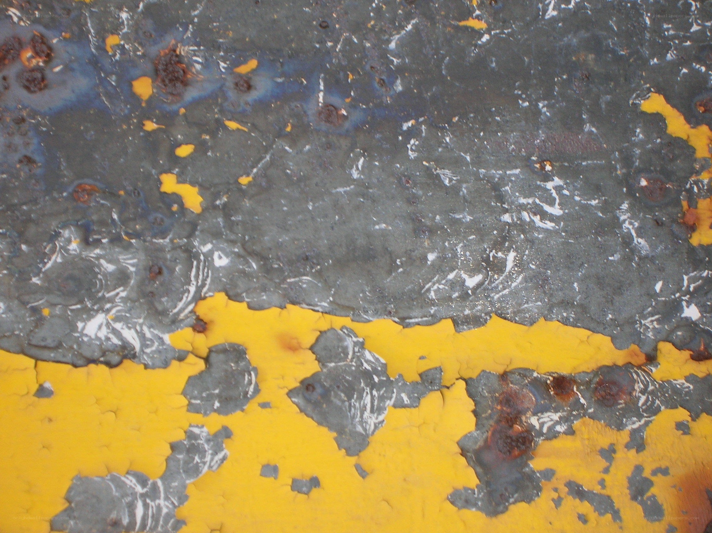 peeling paint on metal surface