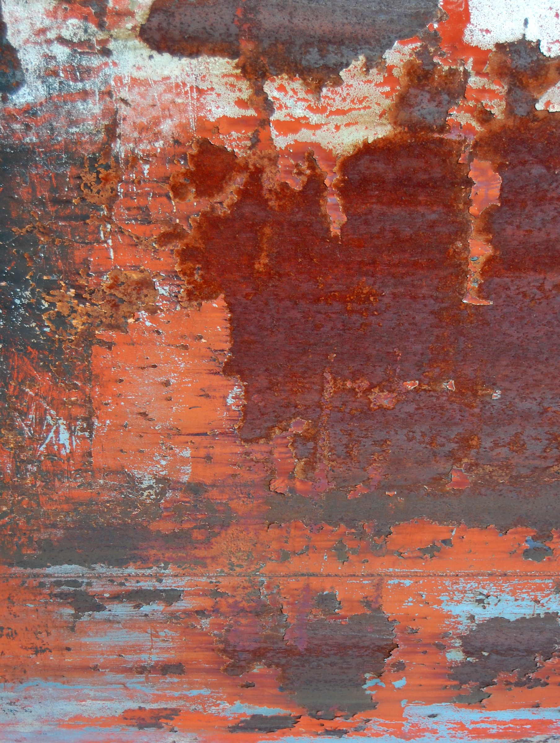 peeling paint on rusty metal