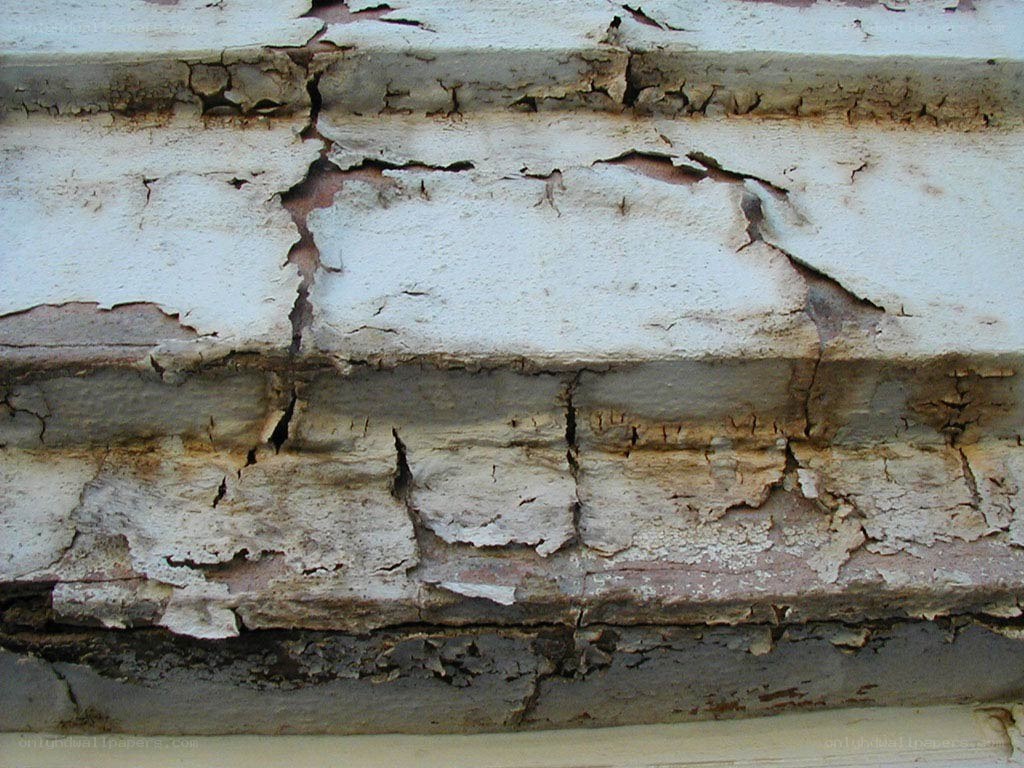peeling paint on wooden surface