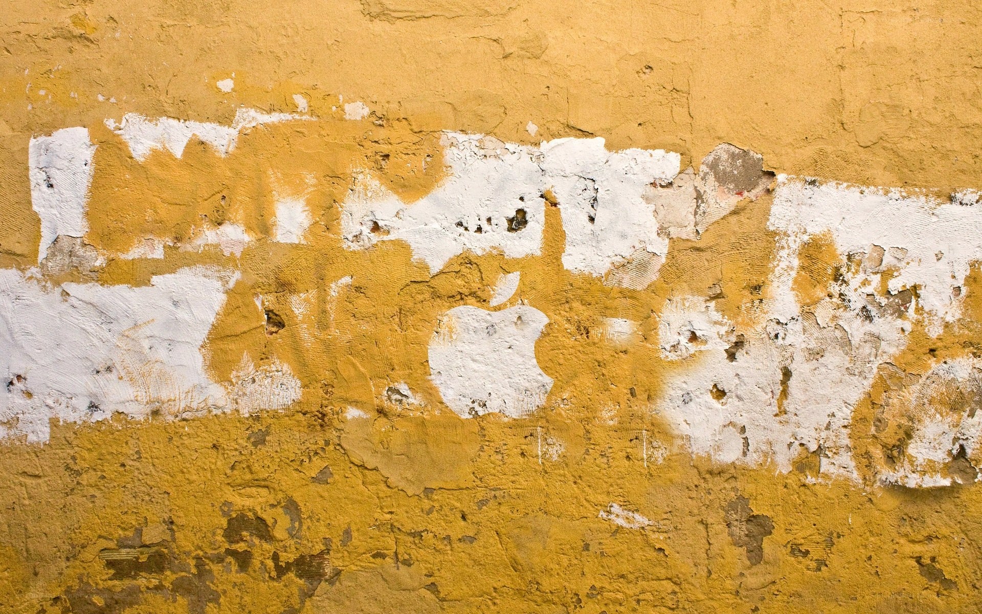 peeling paint wall with apple logo