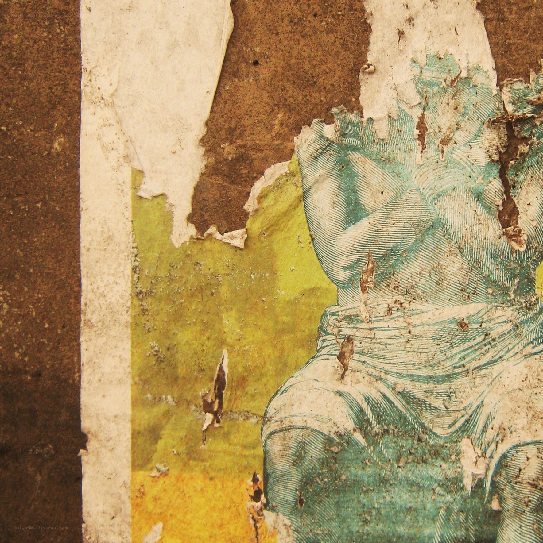 peeling poster of a statue