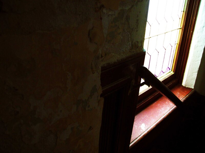 peeling wall near window