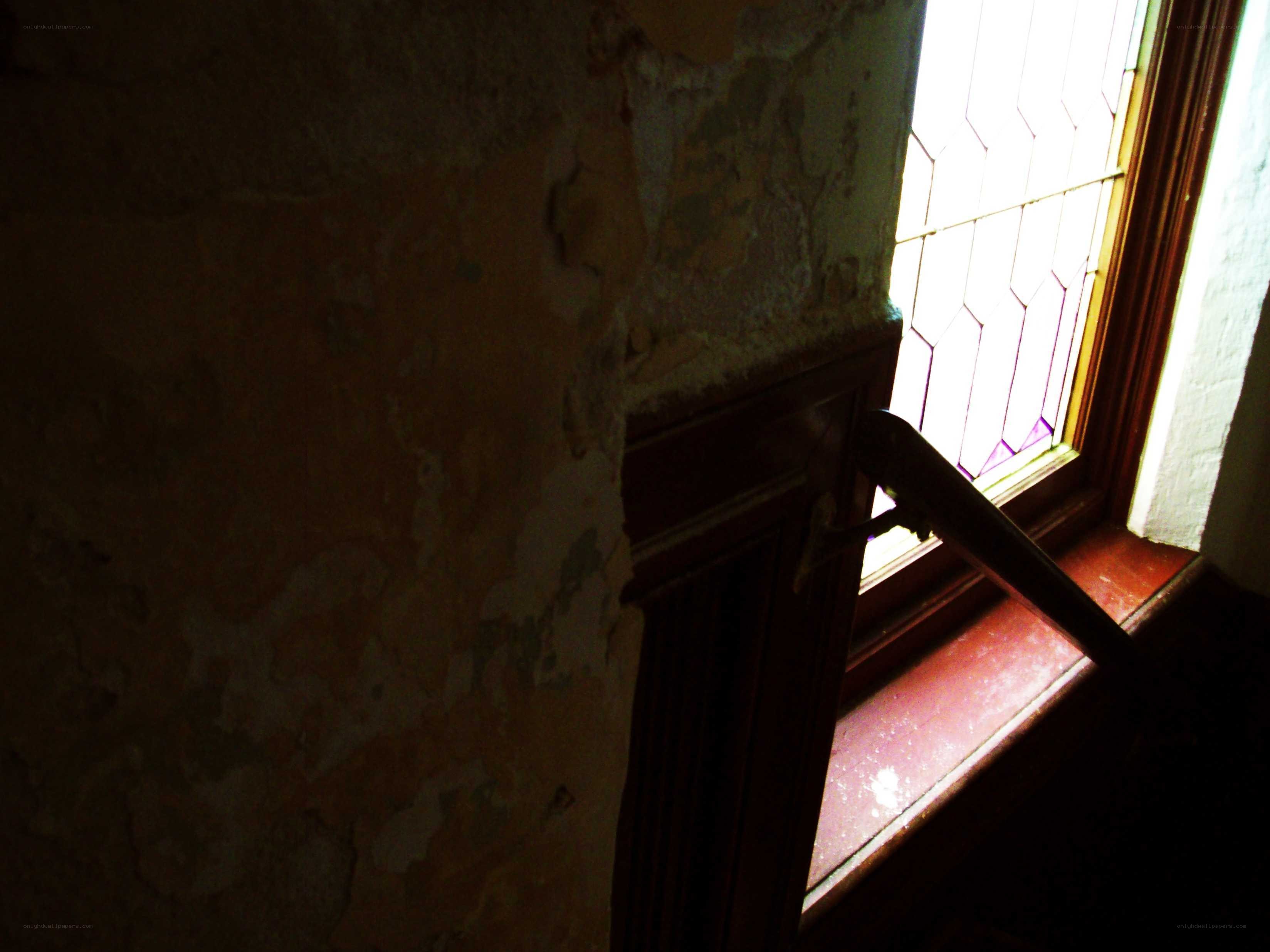 peeling wall near window
