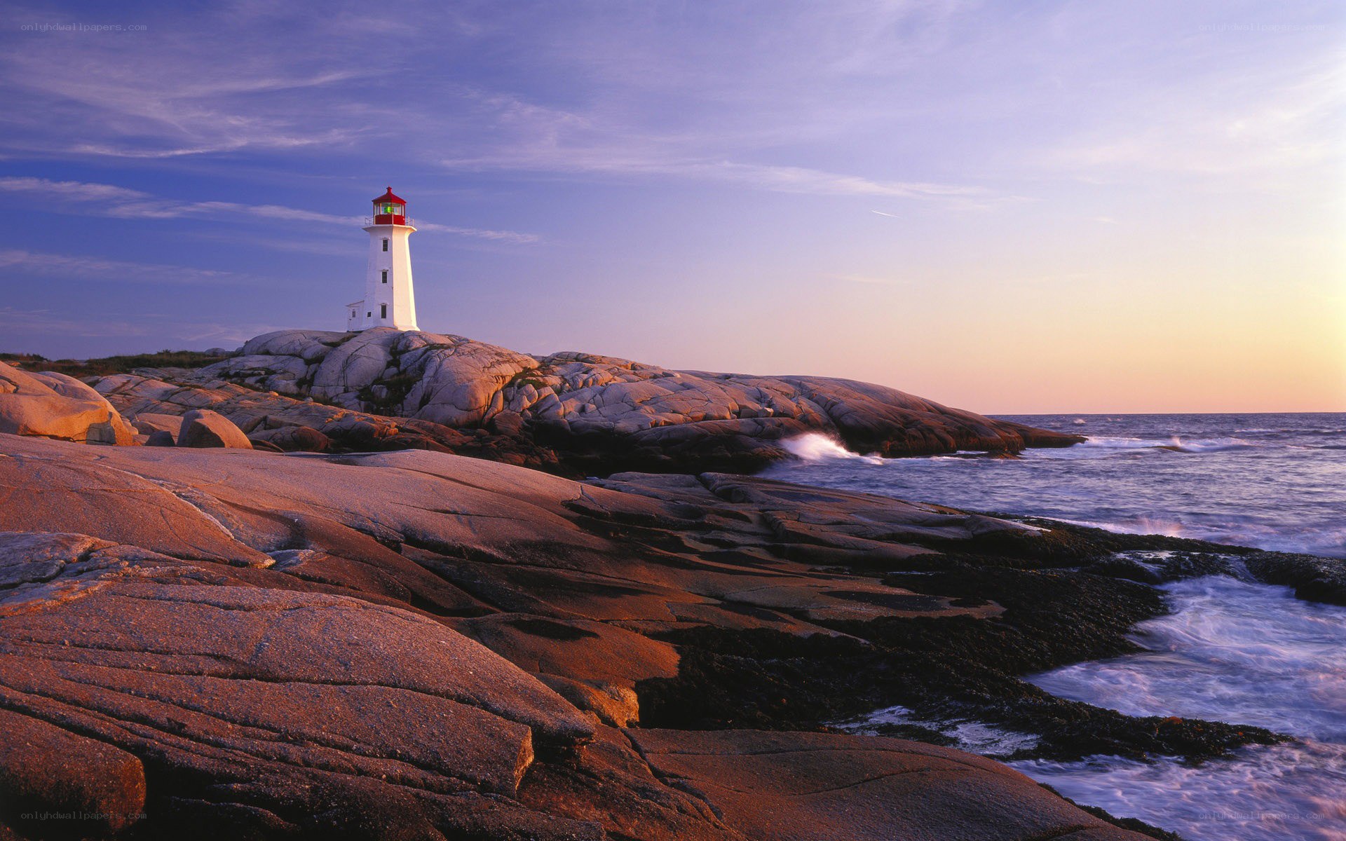 Peggy's Cove lighthouse at sunset