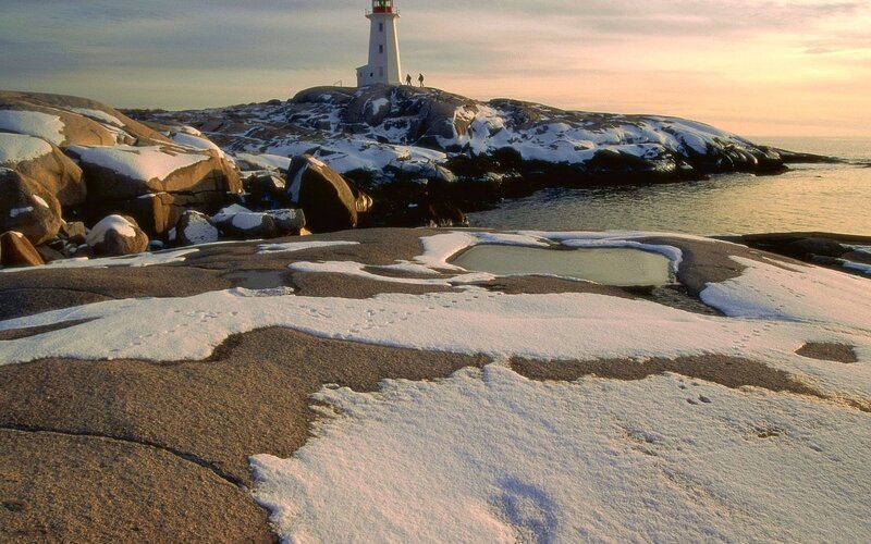 Peggy's Cove lighthouse at sunset