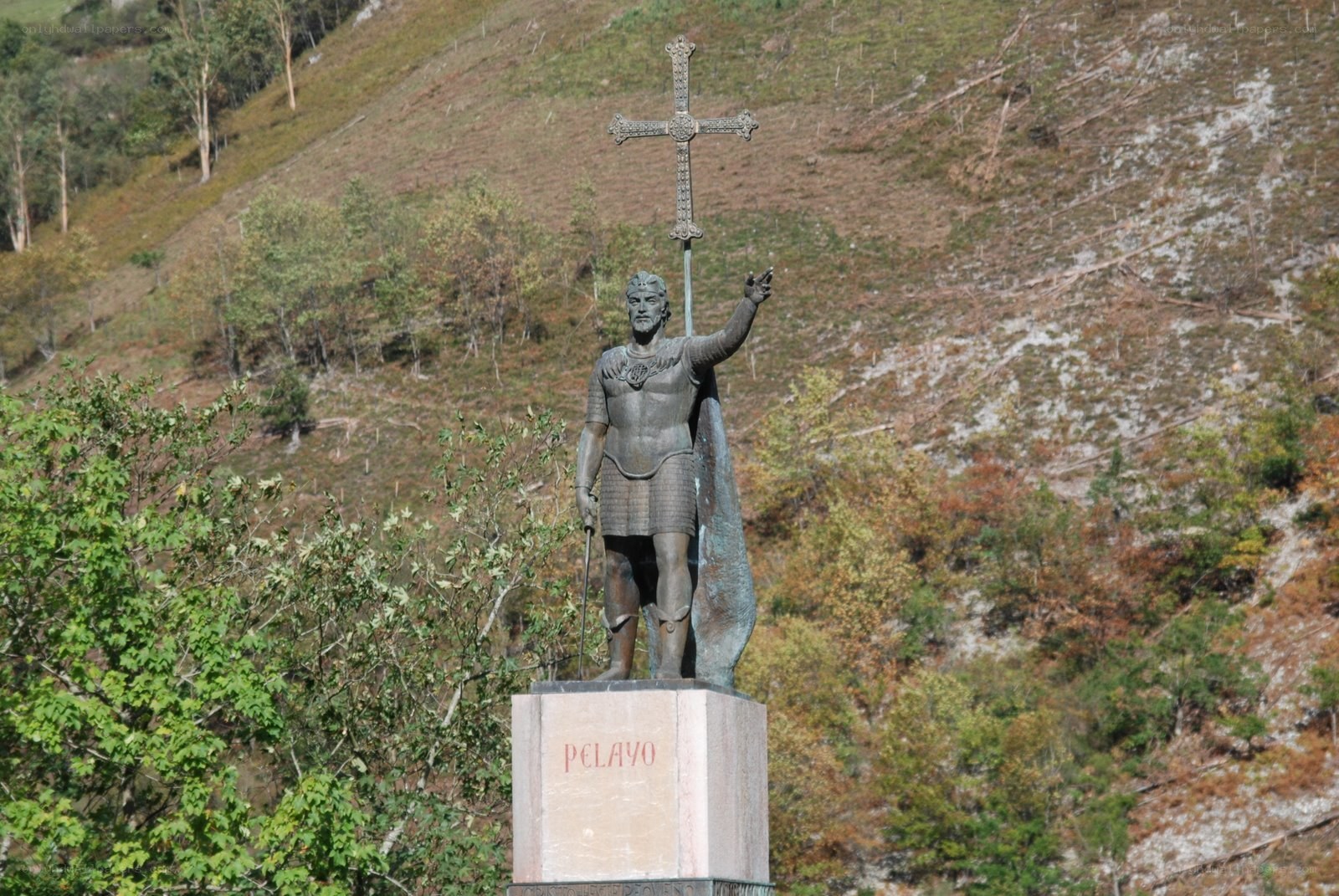 Pelayo statue in mountain landscape