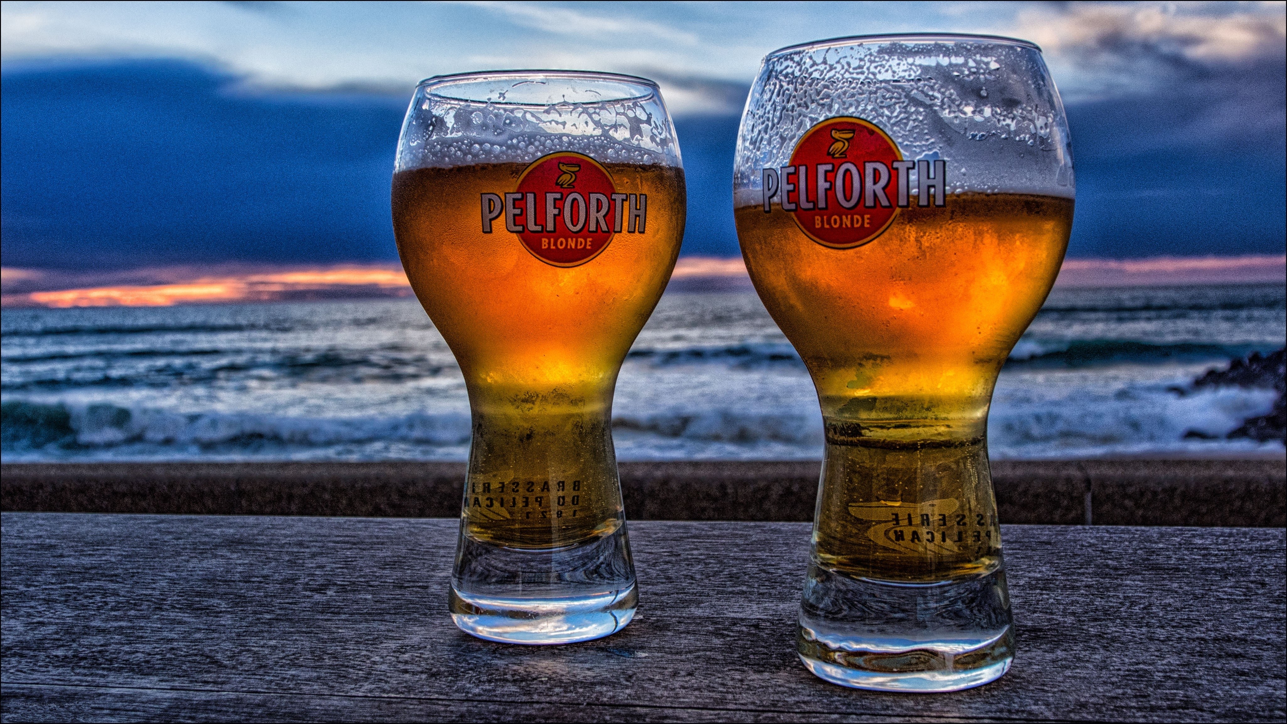 Pelforth beer glasses at sunset