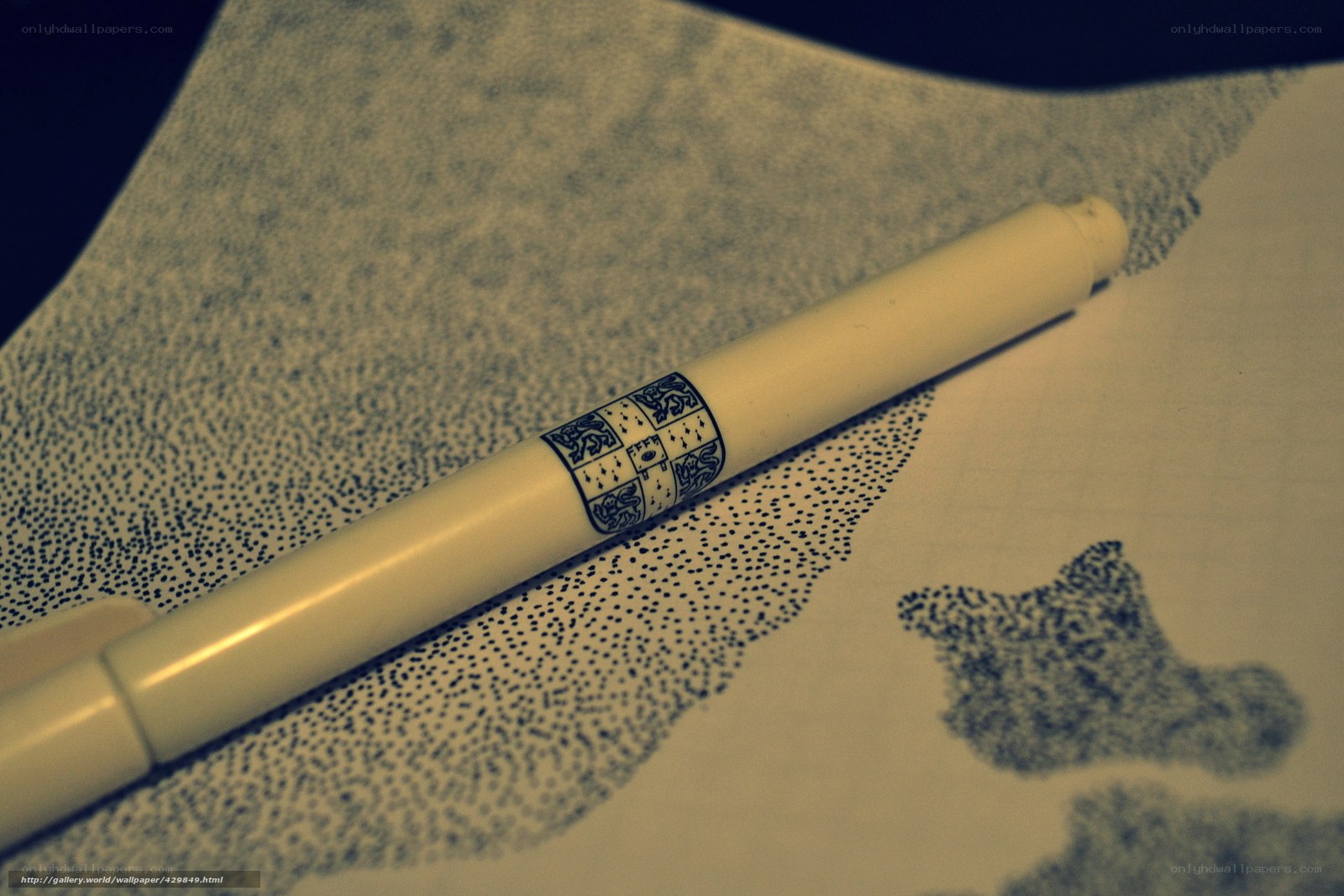 Pen on dotted paper