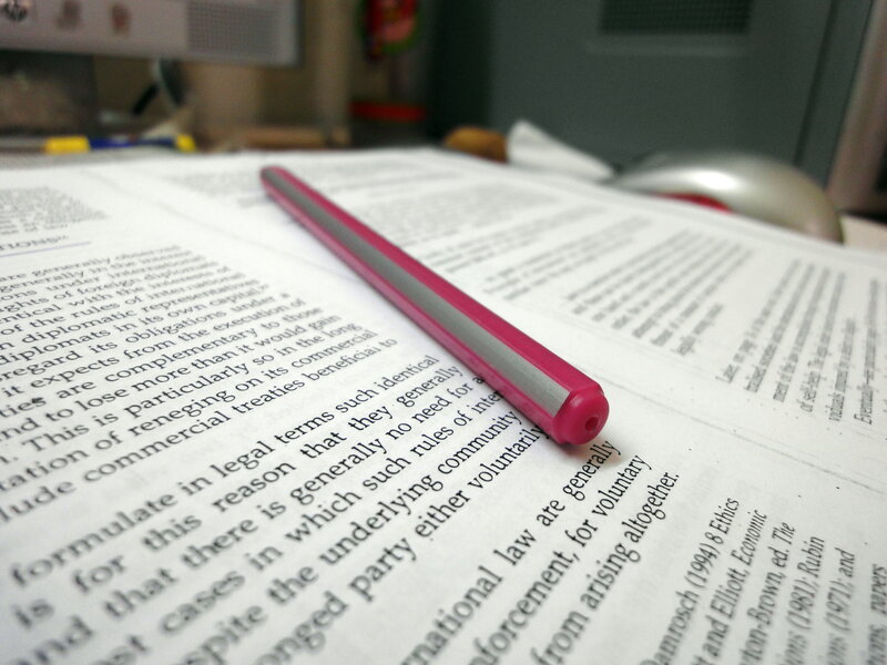 pen on open book