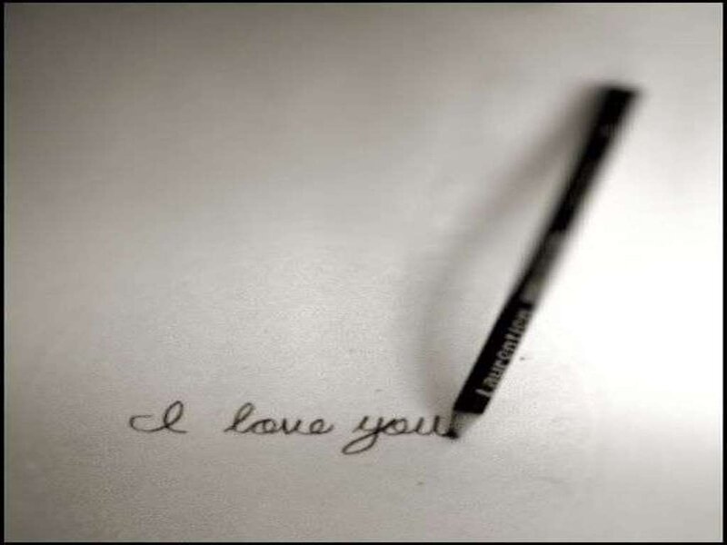Pen Writing on Paper