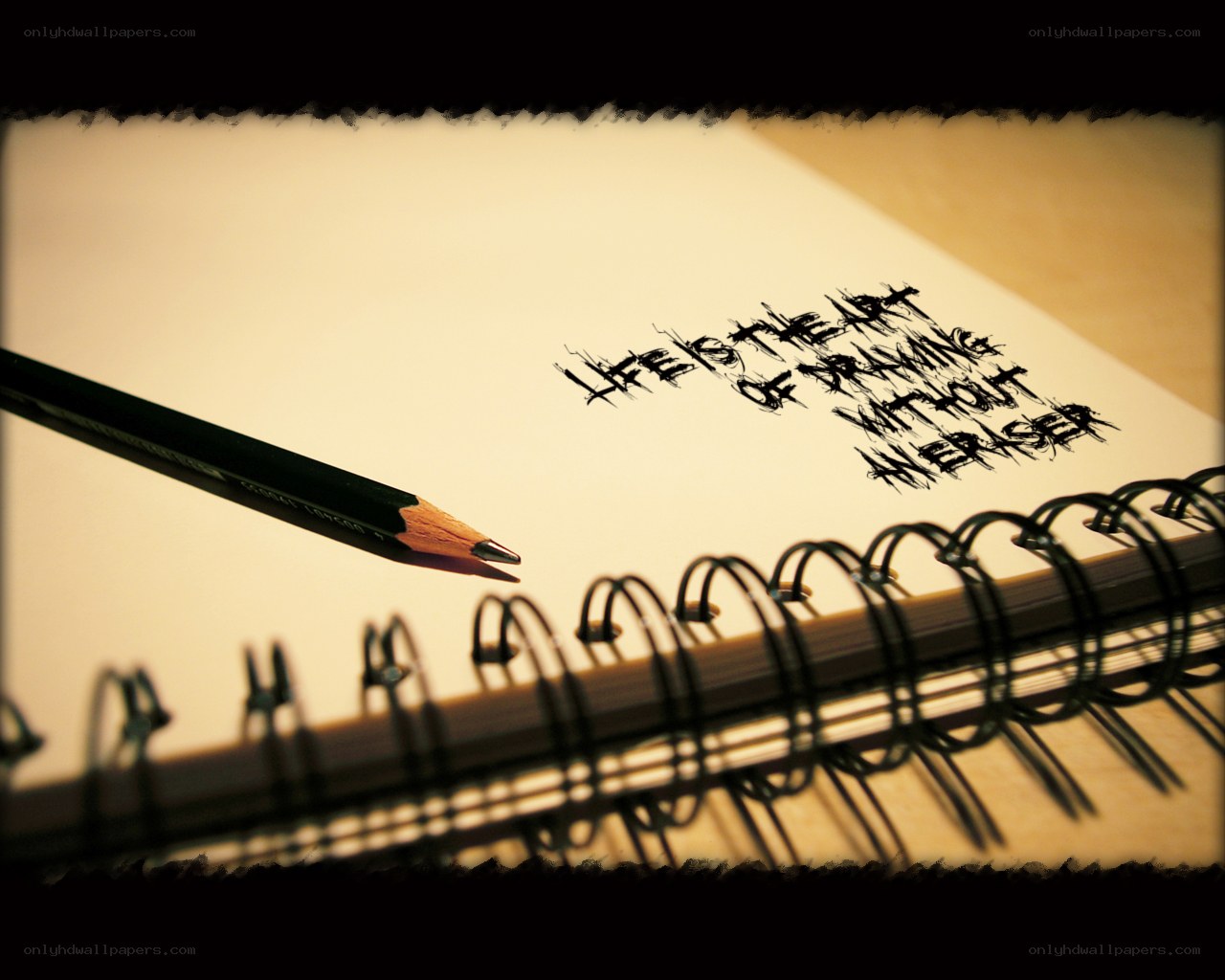 pencil and notebook with quote