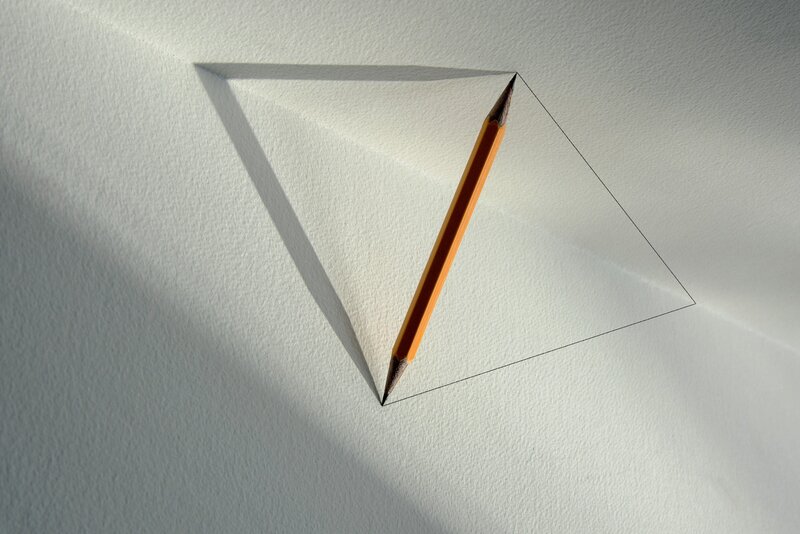 Pencil in Triangle Shadow
