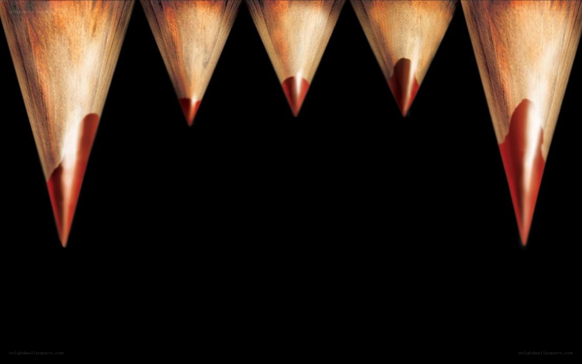 Pencil tips against black background