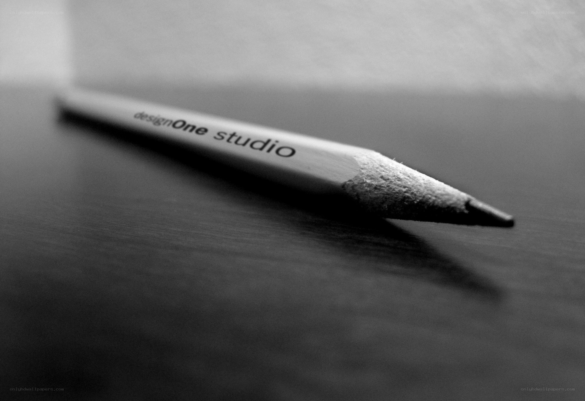 Pencil with designOne studio text