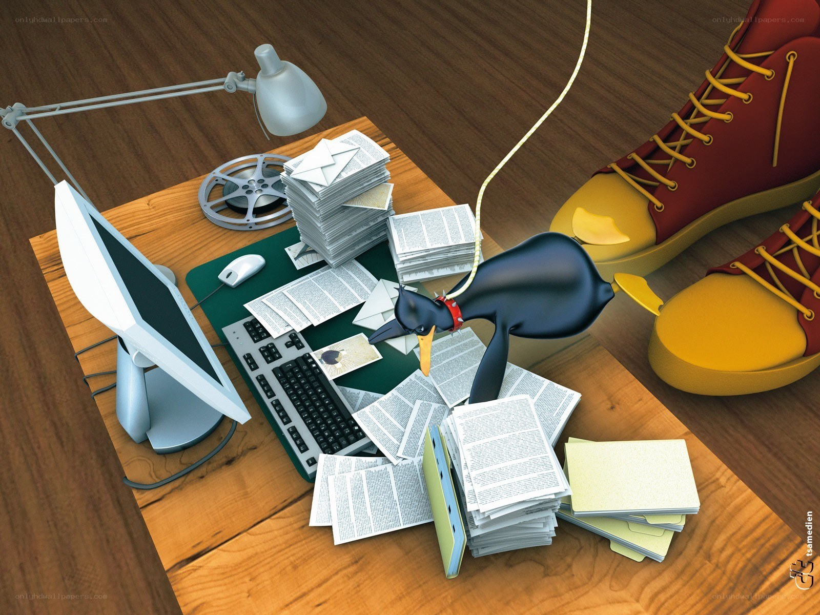 penguin at a messy desk