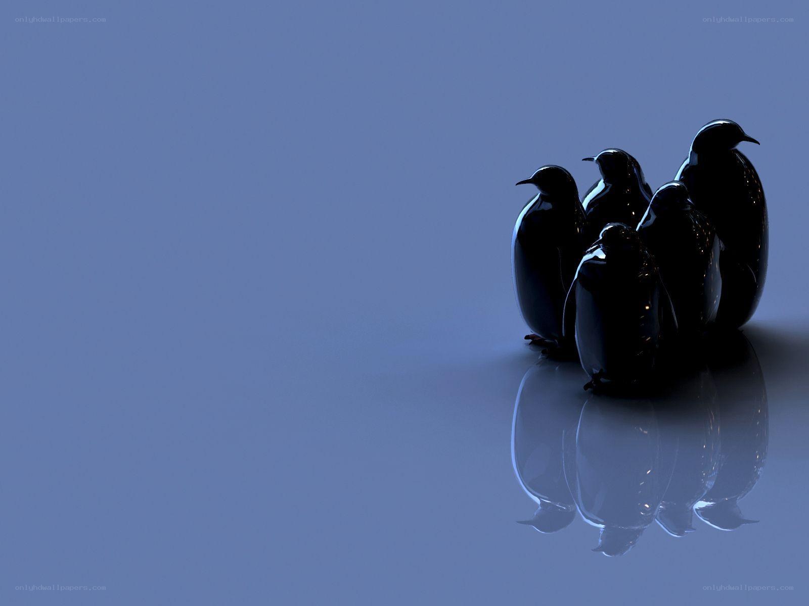 Penguin figurines on blue