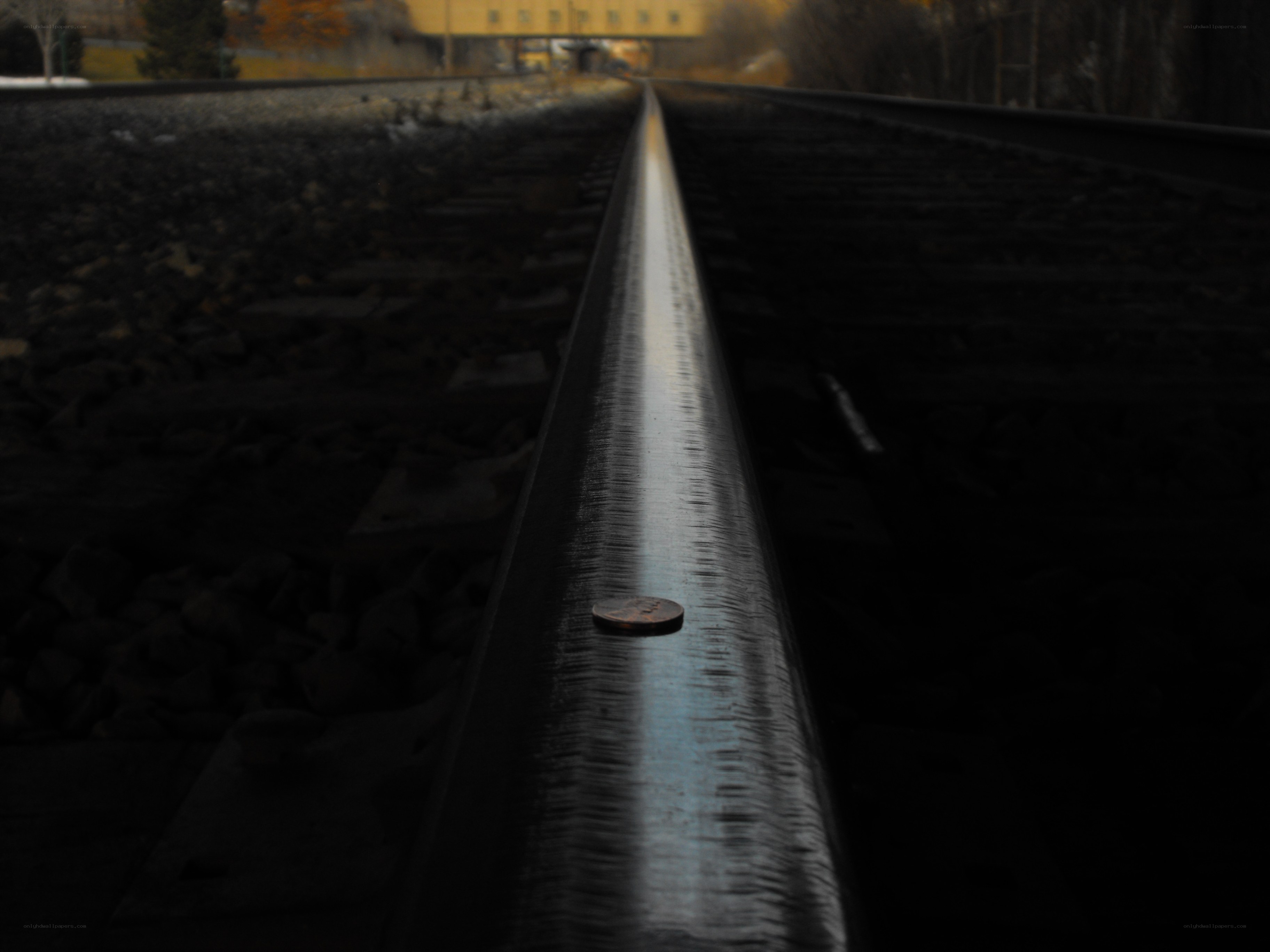 Penny on a train track
