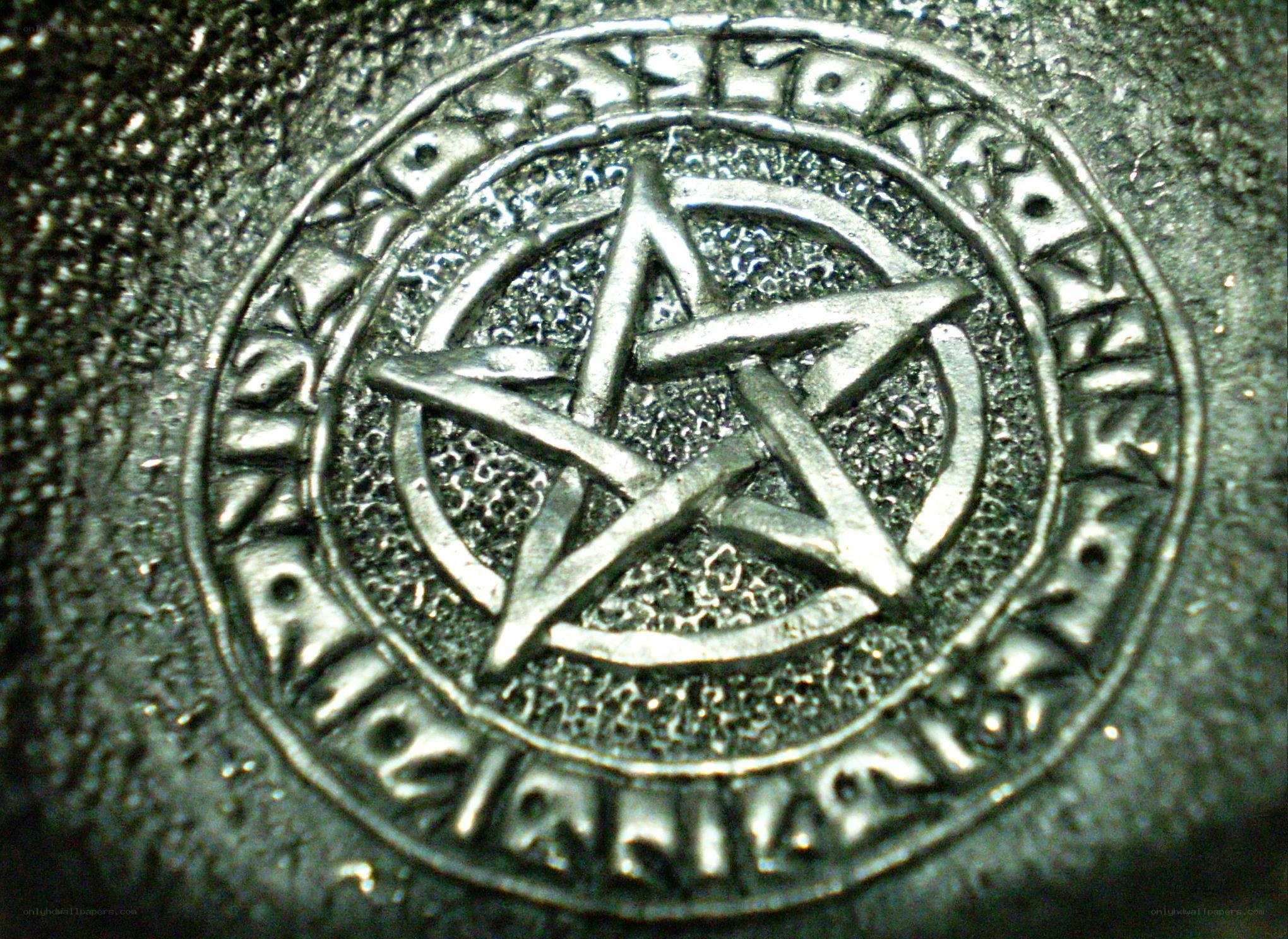 pentagram symbol on metal