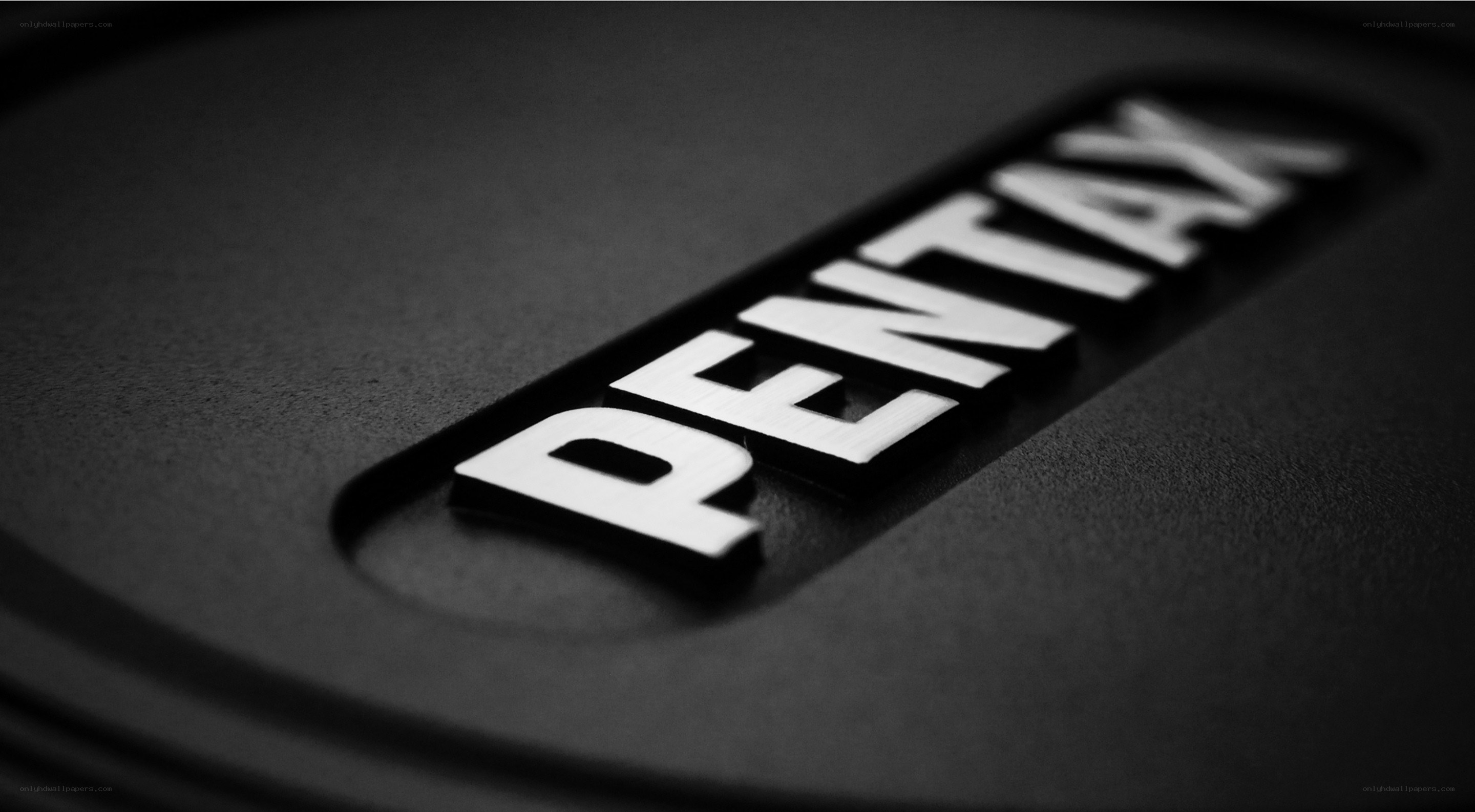 Pentax brand logo close-up