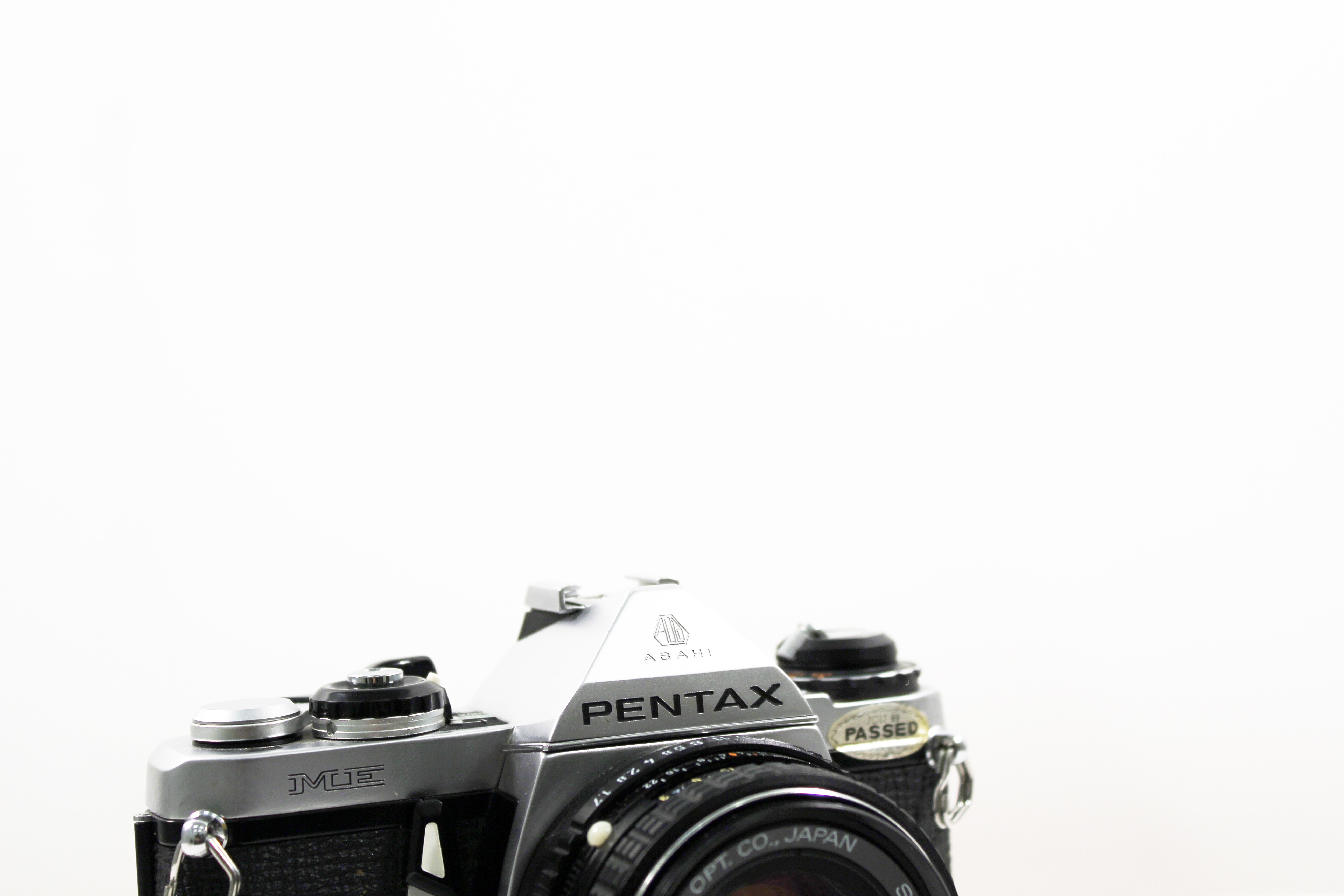 Pentax camera on white background