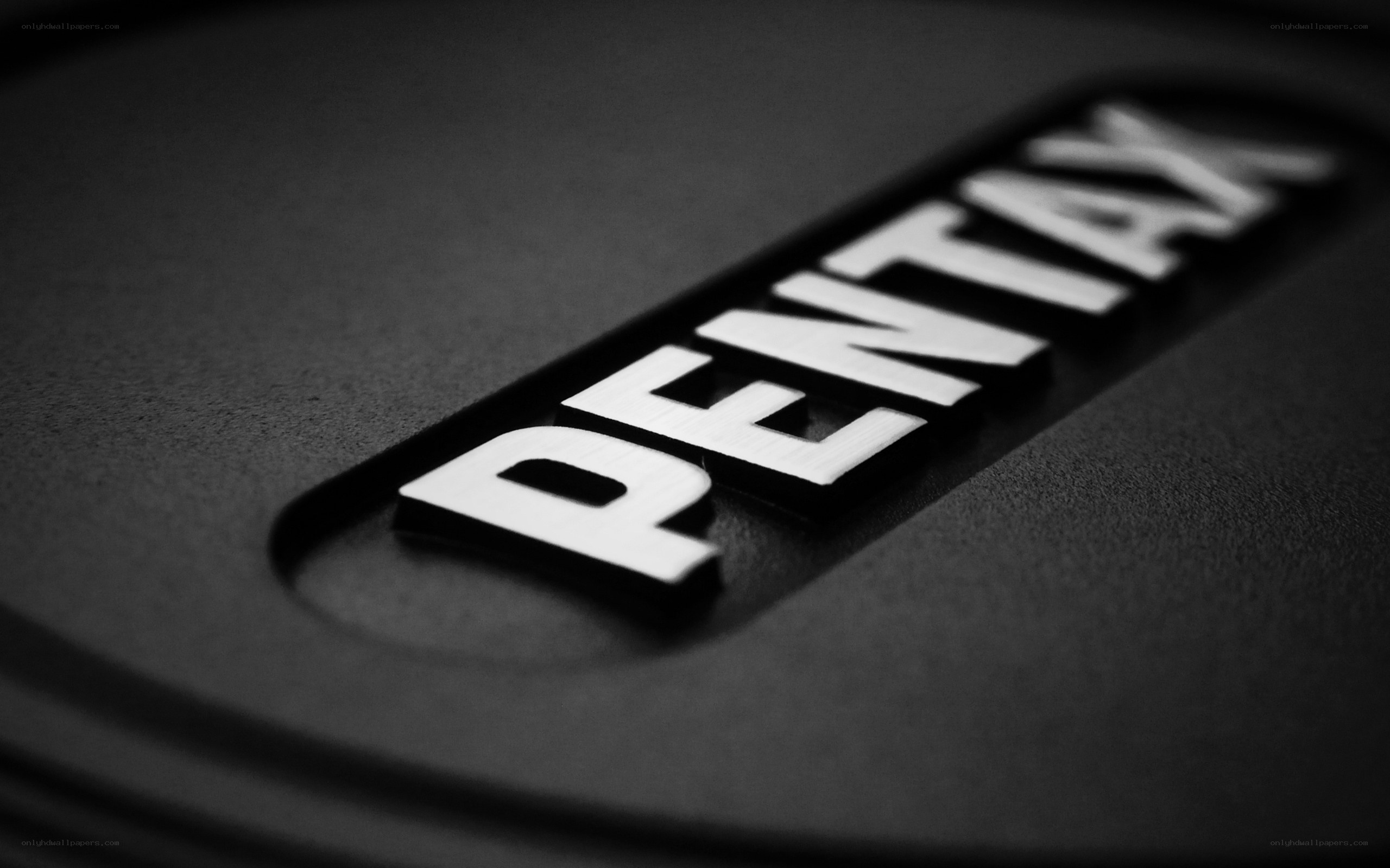 Pentax logo on camera lens