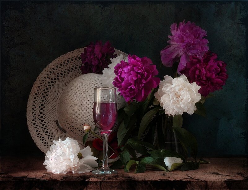 Peonies and a glass of wine