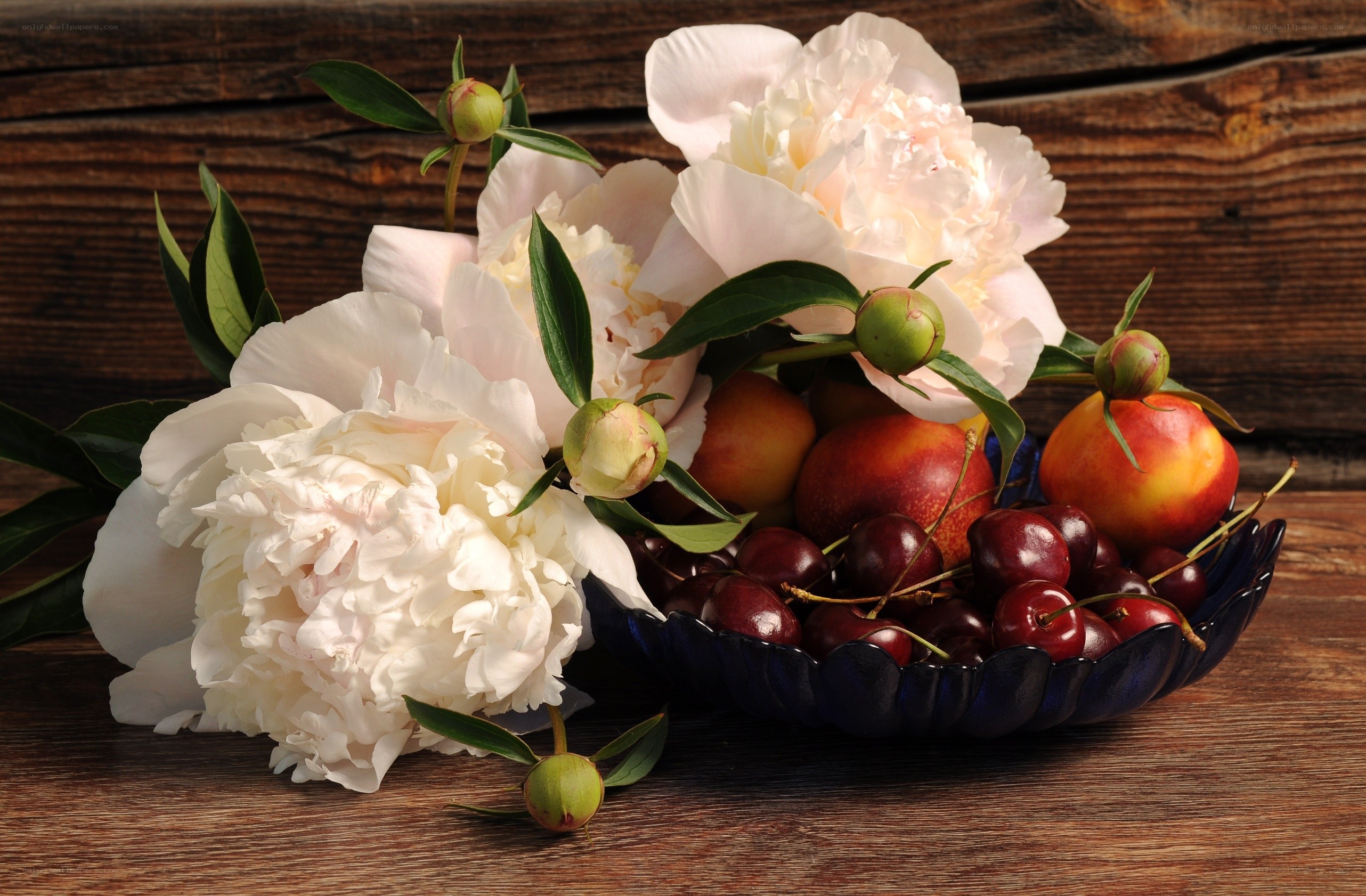 peonies and fruit arrangement