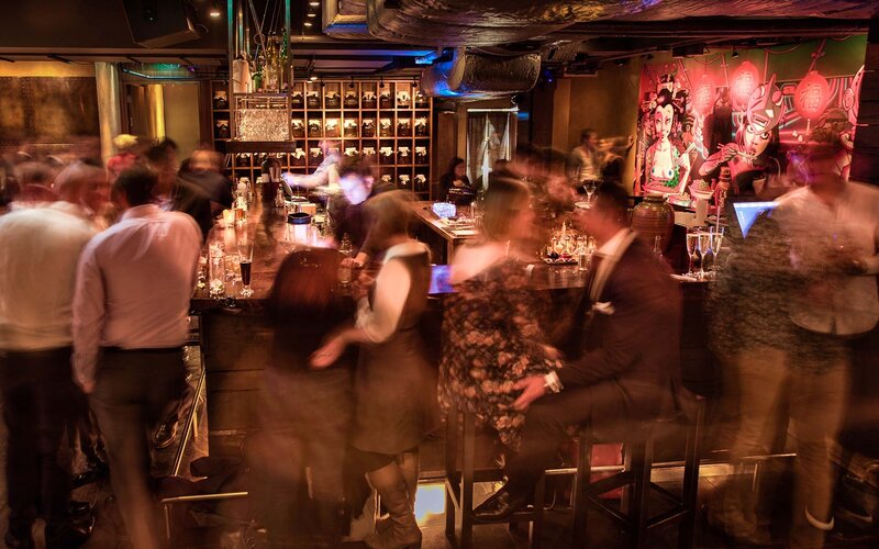 People at a Bar — Brown, Lively