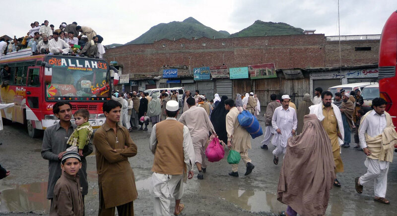 People at a bus station