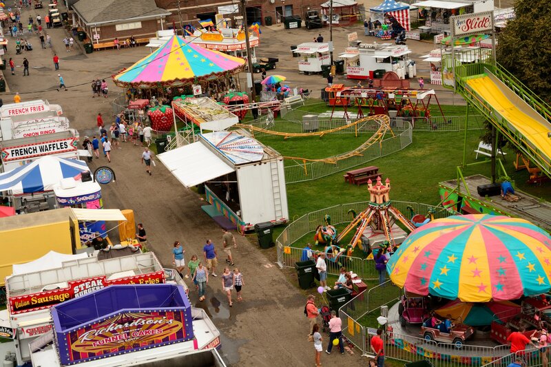 People at a Fair — Yellow