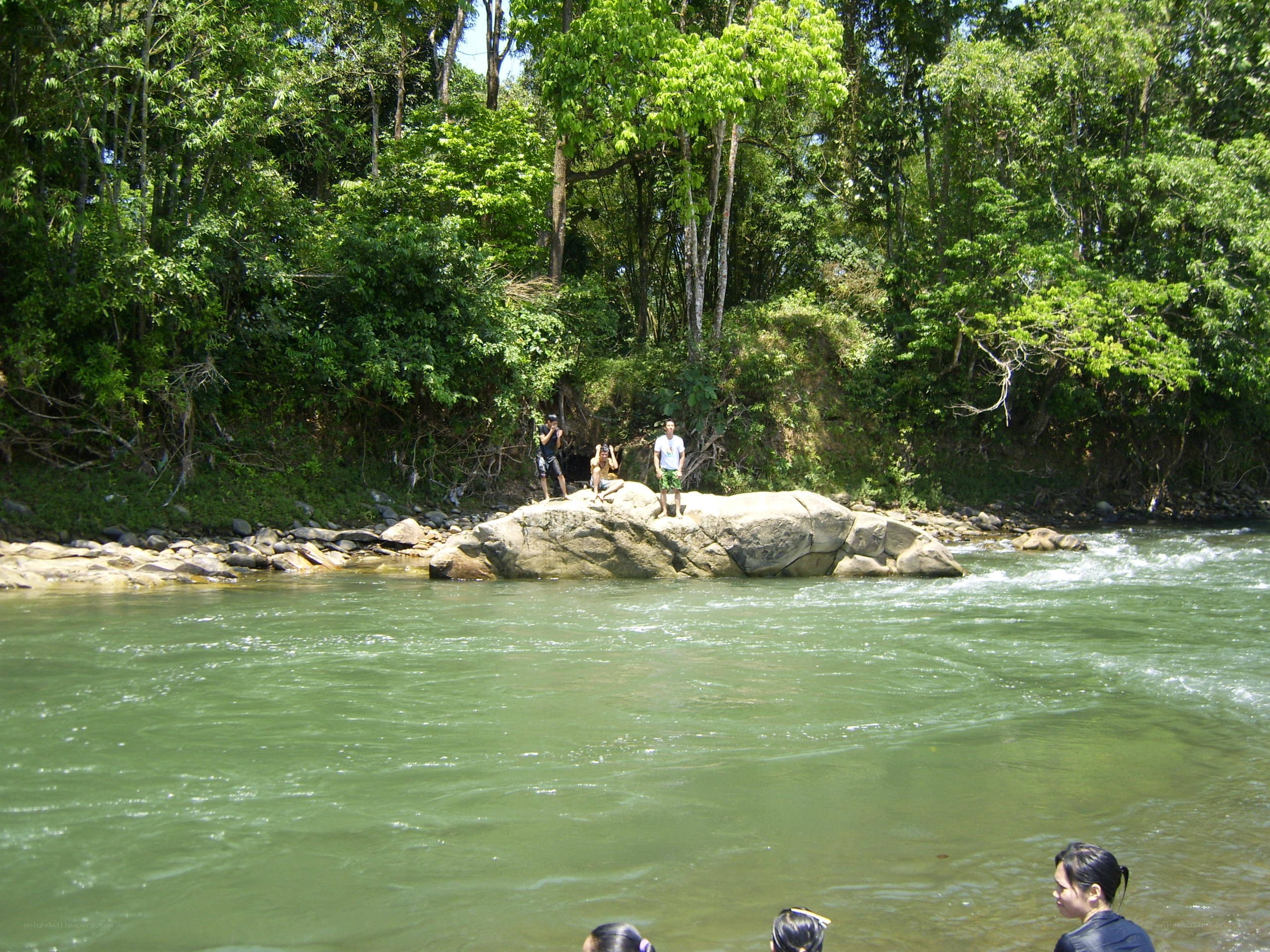 People at a riverbank