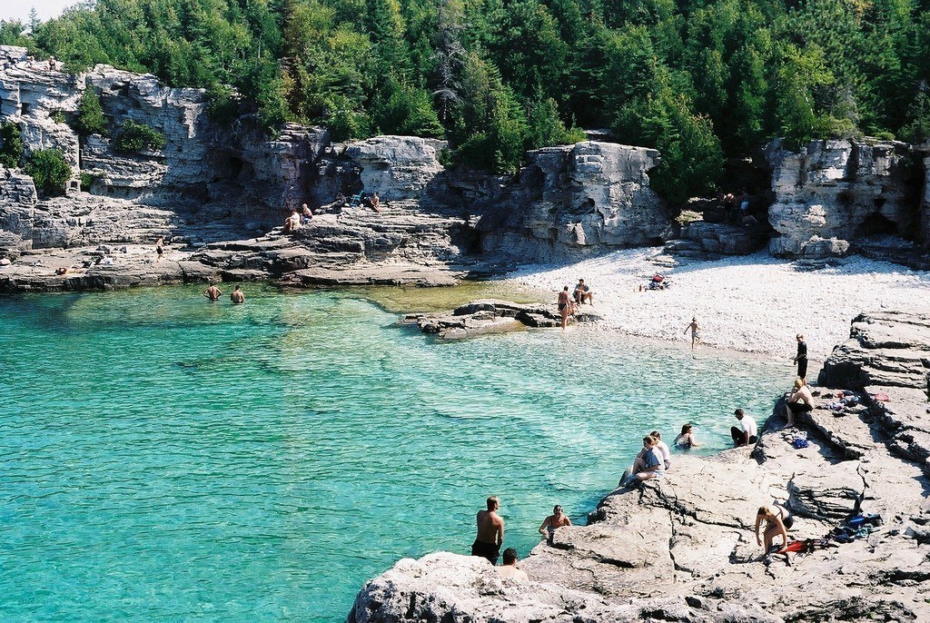 People at a rocky beach
