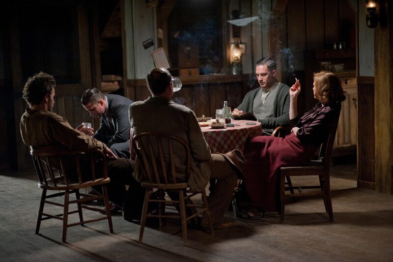 People at a table in a dimly lit room
