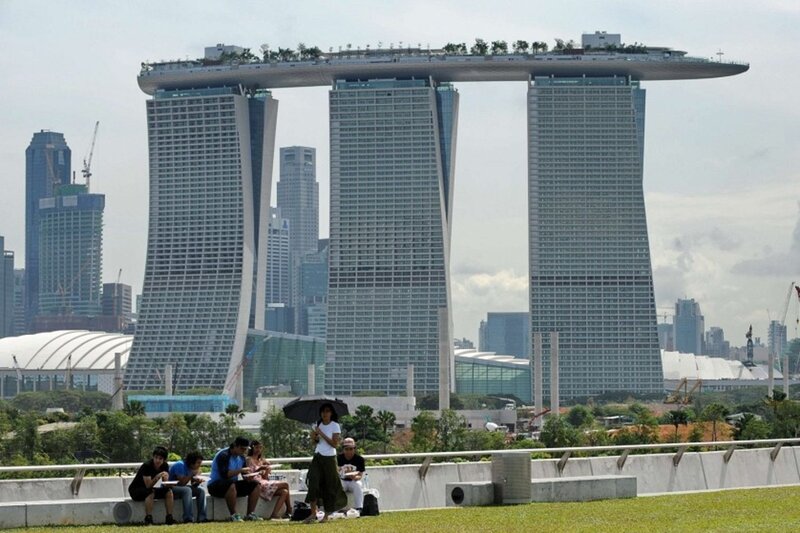 People at Park Near Towers