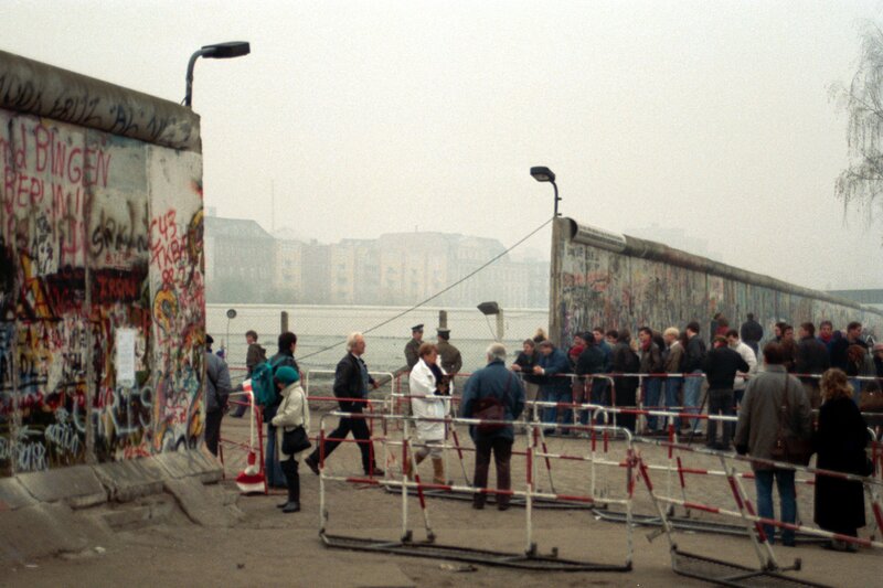 People at the Berlin Wall