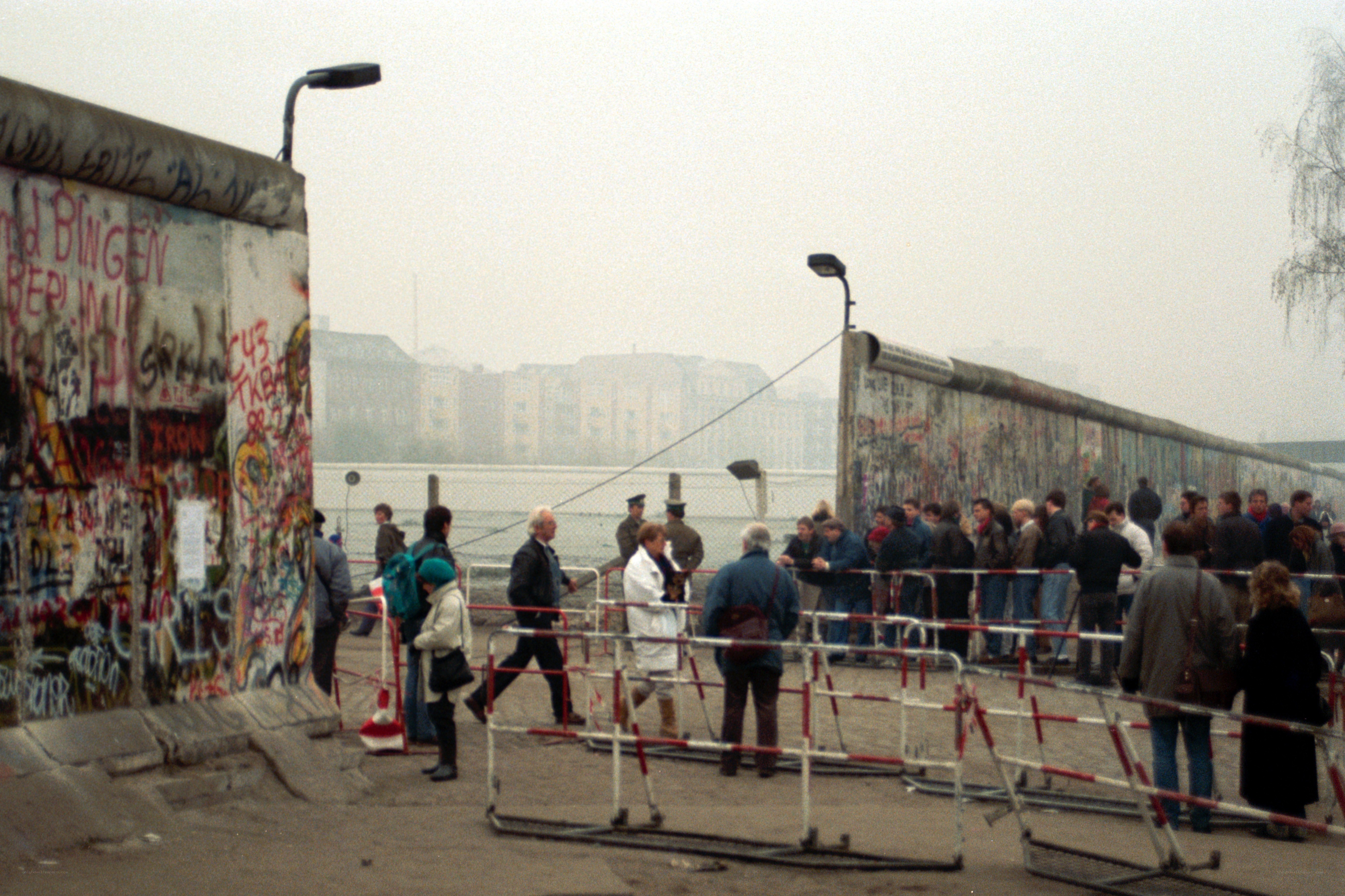 People at the Berlin Wall
