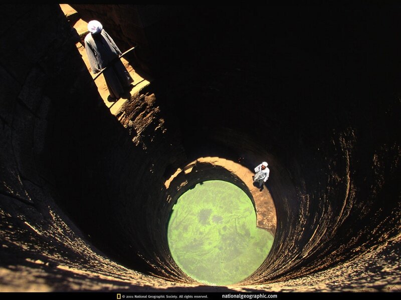 People at the bottom of a deep well
