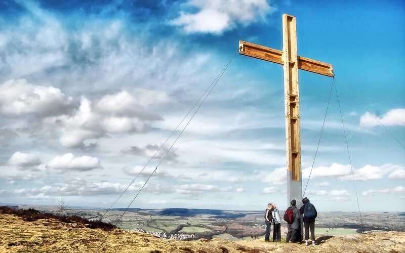 People at Wooden Cross