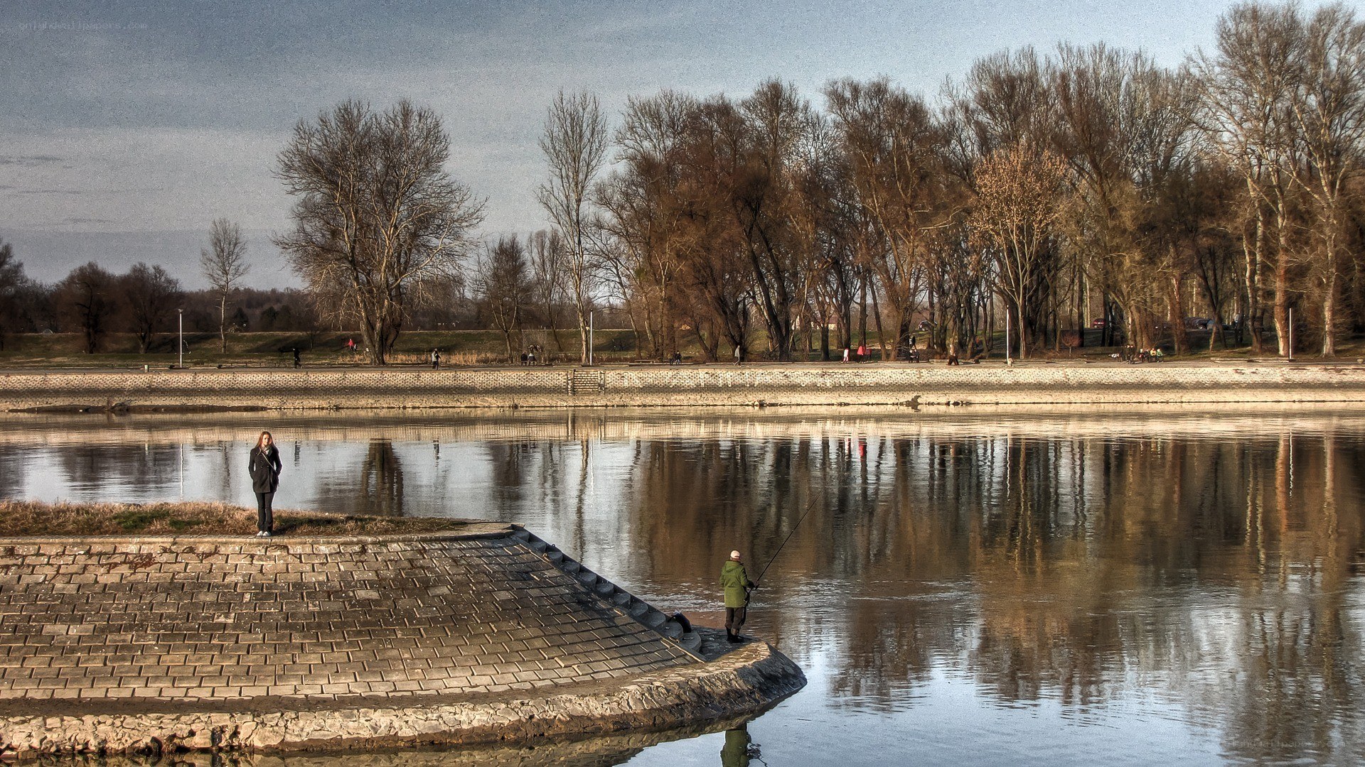 People by the riverbank