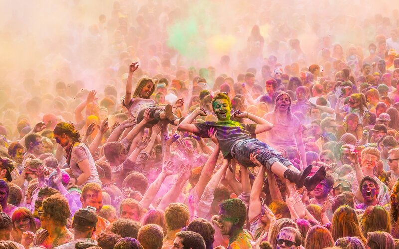 People Celebrating Holi Festival — Pink, Joyful, Afternoon