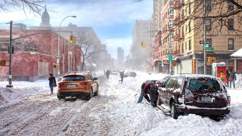 People Clearing Snow from Cars