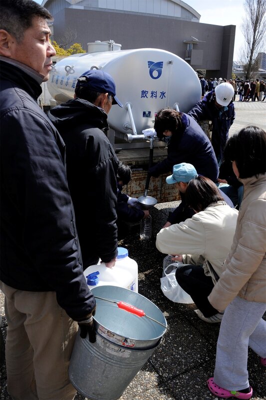 People Collecting Water