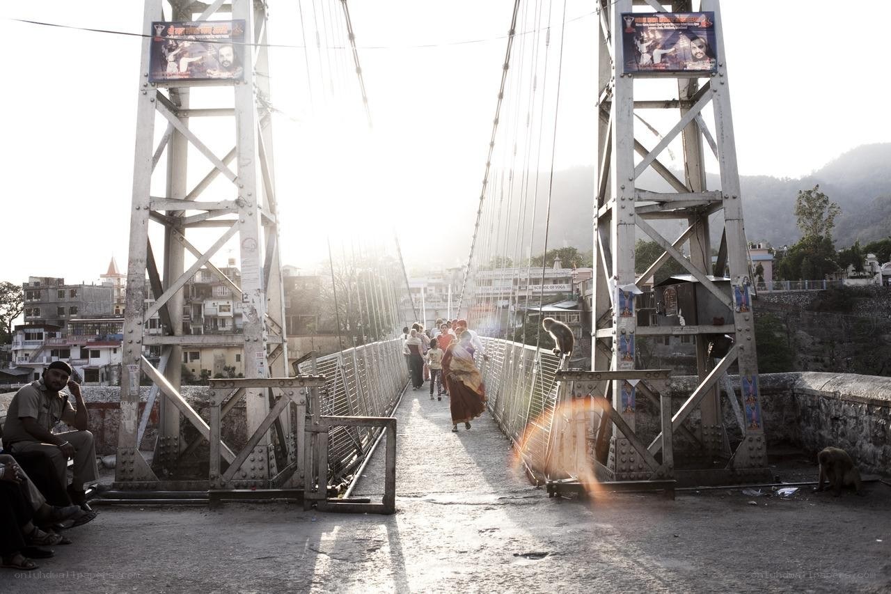 People crossing a suspension bridge