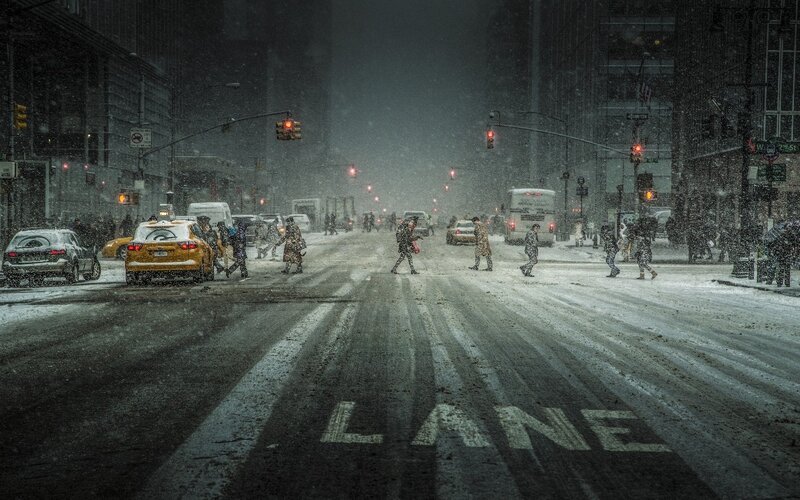 People Crossing Snowy Street